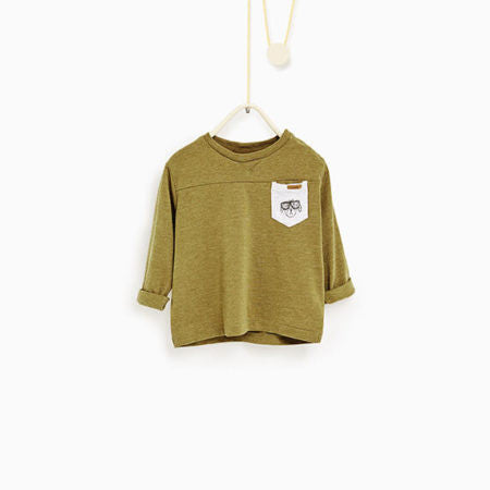 Embroidered pocket top